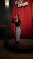 Mic in one hand, crowd in the other