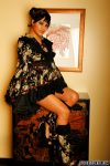 Chinese ProDomme wearing sheer pantyhose at Fetish Fortress