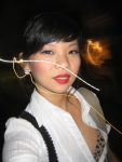 Chinese ProDomme wearing sheer pantyhose at Fetish Fortress