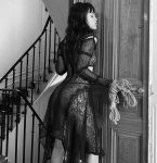 Chinese ProDomme wearing sheer pantyhose at Fetish Fortress