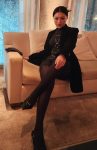 Chinese ProDomme wearing sheer pantyhose at Fetish Fortress