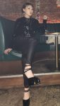 Chinese ProDomme wearing sheer pantyhose at Fetish Fortress