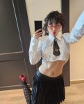 Chinese ProDomme wearing sheer pantyhose at Fetish Fortress