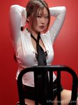Chinese ProDomme wearing sheer pantyhose at Fetish Fortress